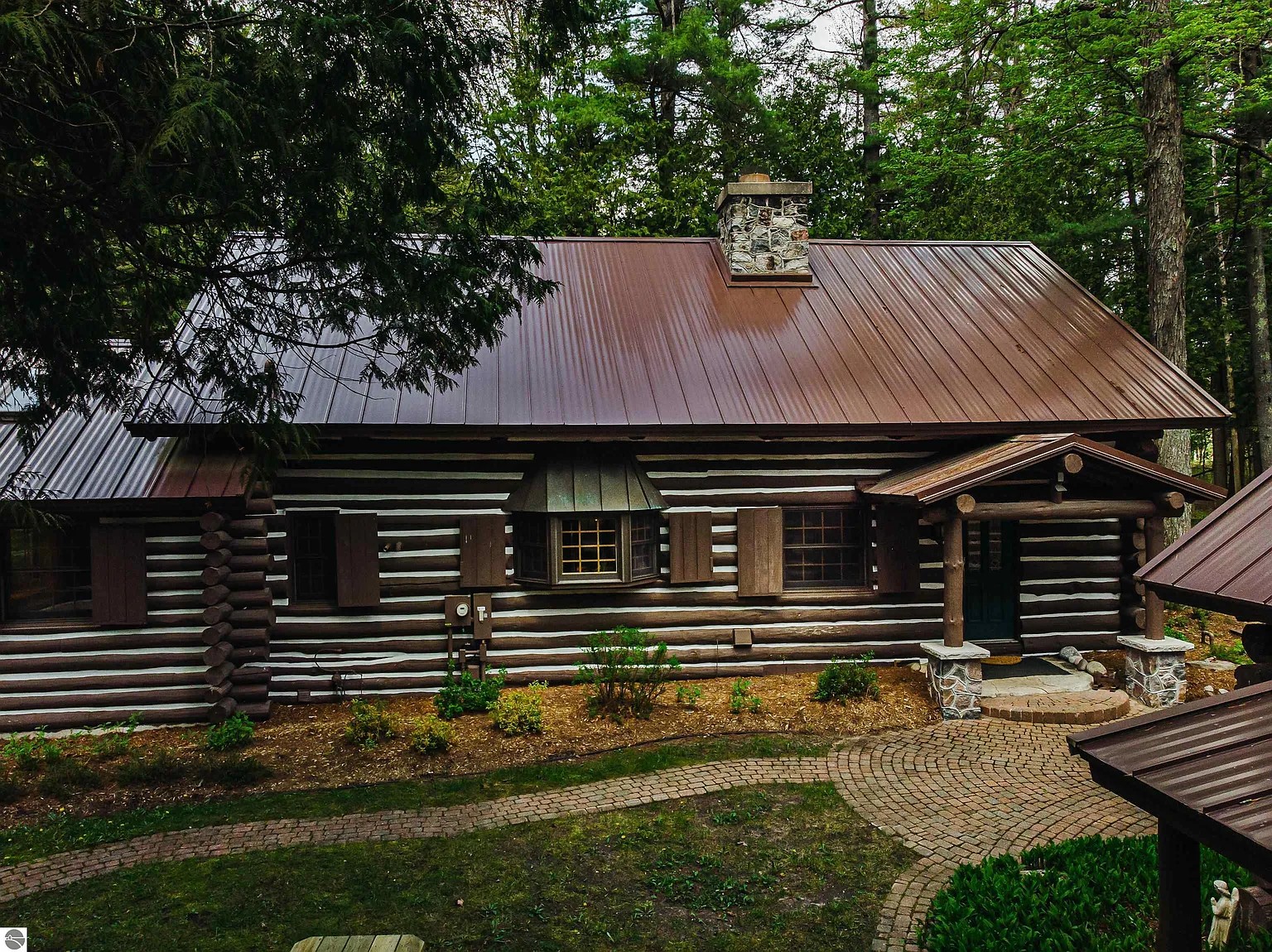 Riverfront lodge on the Boardman River in Williamsburg Michigan
